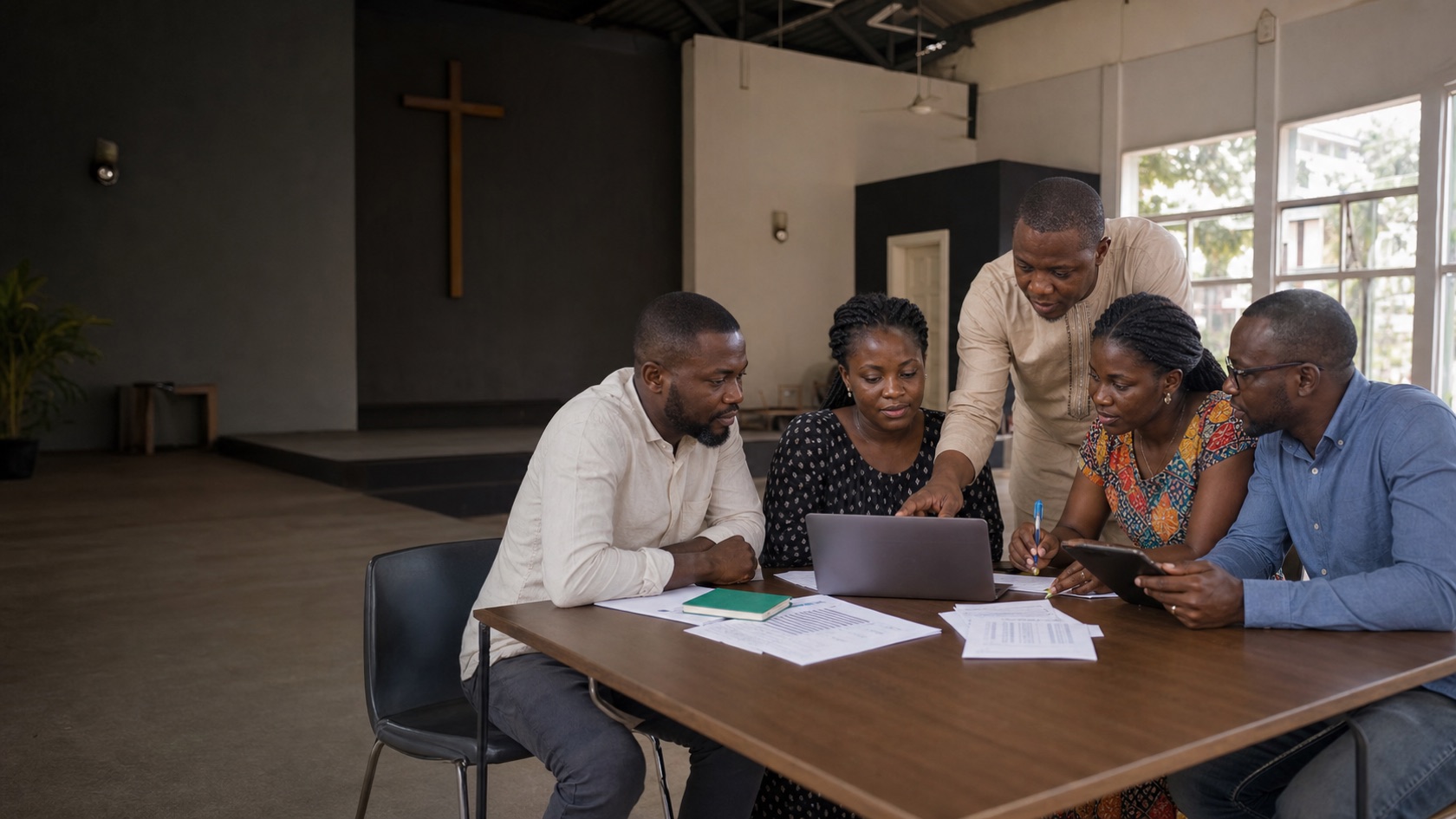Church leaders and volunteers planning ministry work together